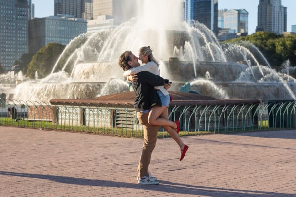 Newly Engaged couple celebrates their proposal at The Buckingham Fountain in Chicago