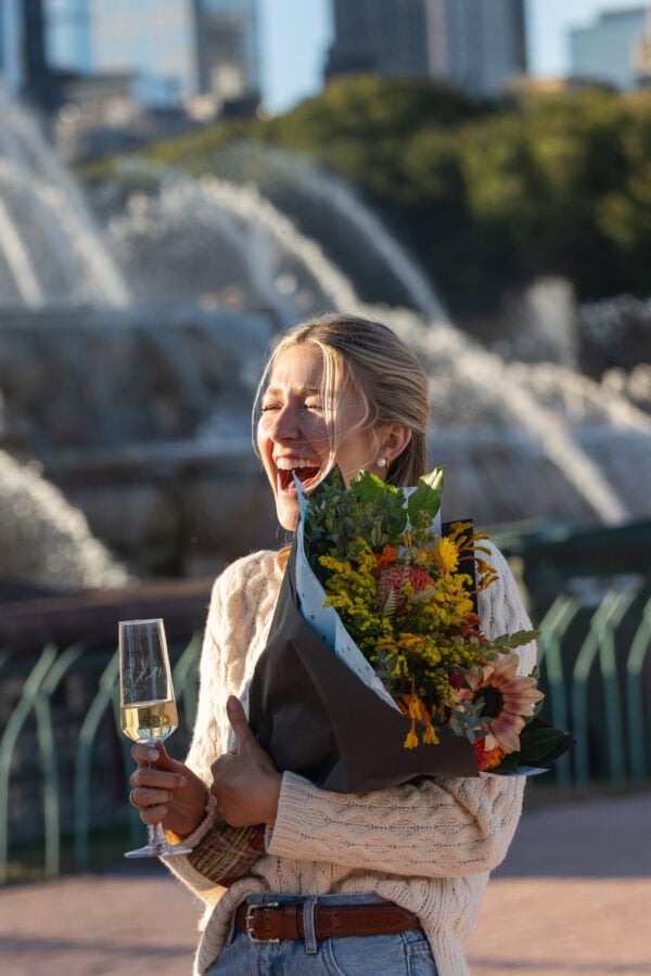 Newly engaged woman smiles in celebration of just getting proposed to in Chicago