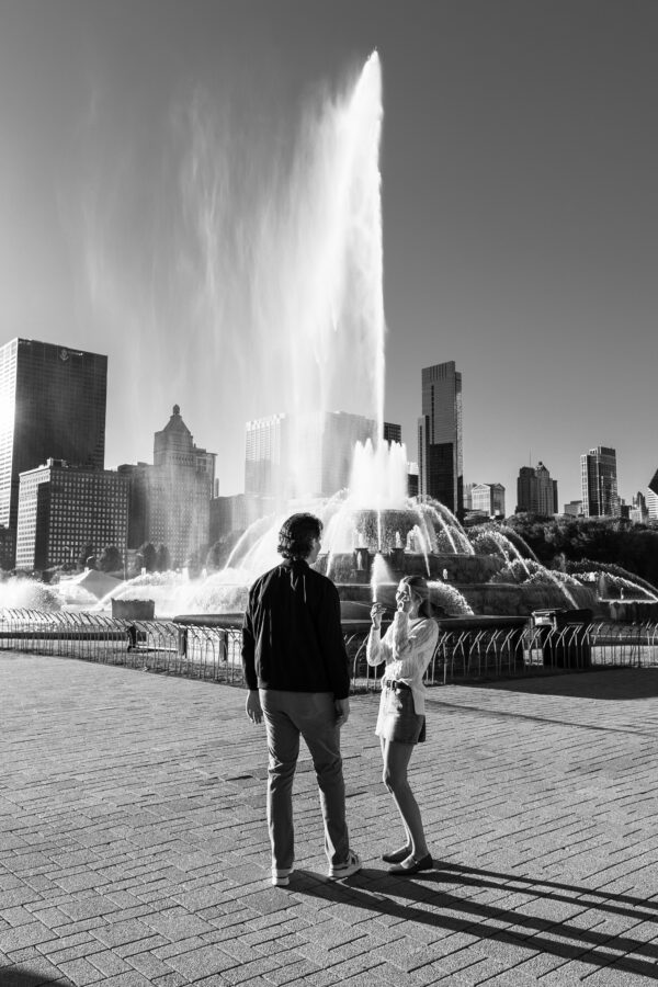Newly Engaged couple celebrates their proposal at The Buckingham Fountain in Chicago