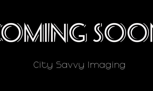 COMING SOON" in stylized font on a black background, with "City Savvy Imaging" written underneath, specializing in exceptional post-wedding photoshoots.