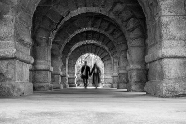 Couple poses for a photo during an engagement session at Lincoln Park Zoo Chicago